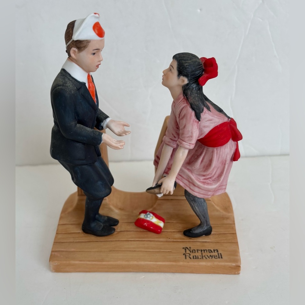 Norman Rockwell Figurine with Red and Black Accents